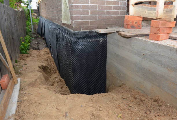 Happy homeowners after waterproofing job in Cottontown